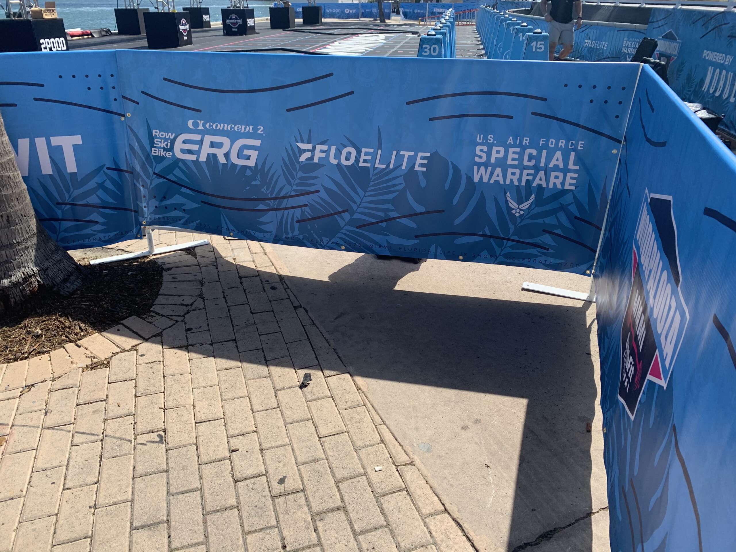 Barricade banner displaying logos and safety messages