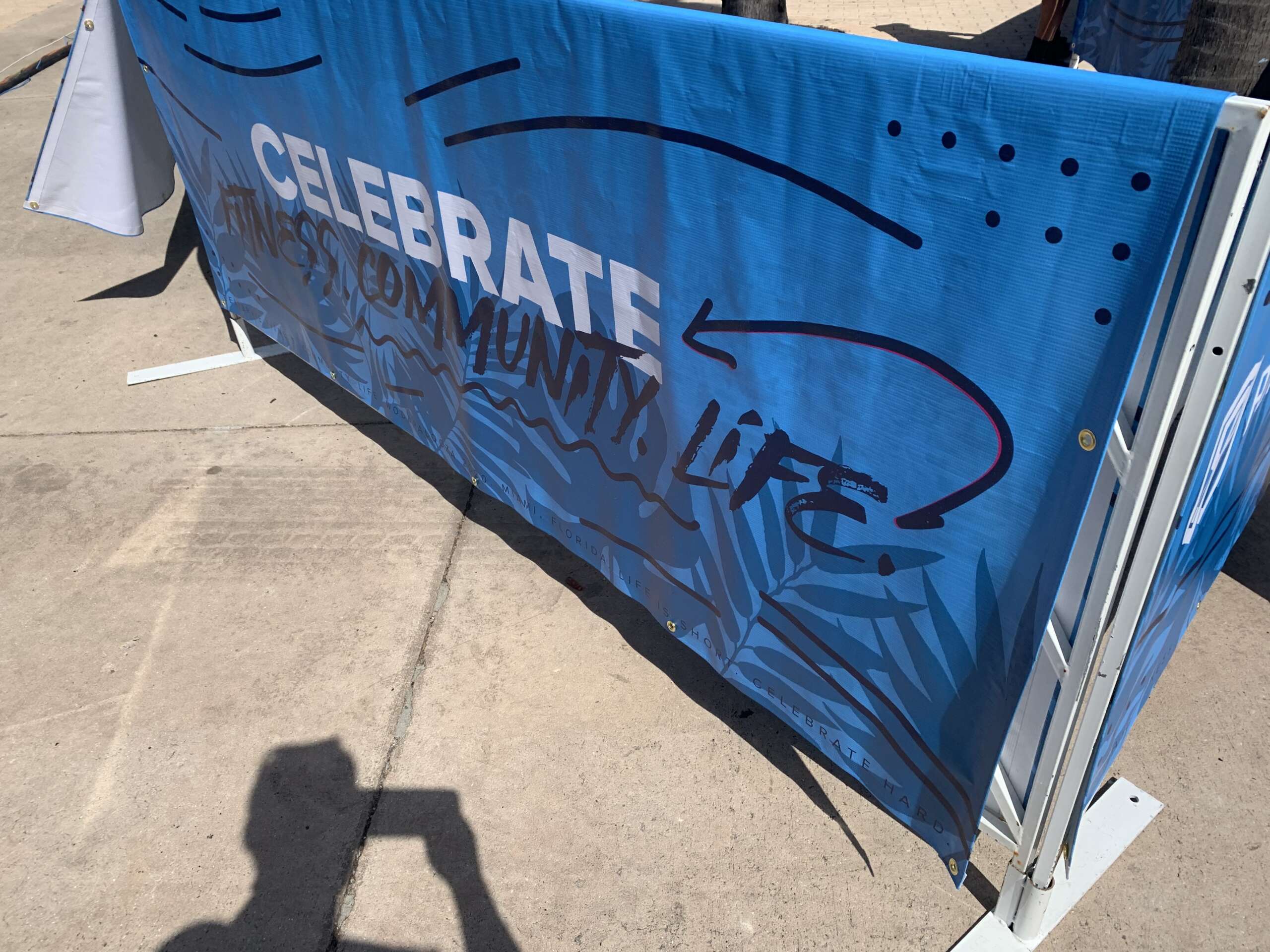 Brand-enhancing barricade signage for large gatherings