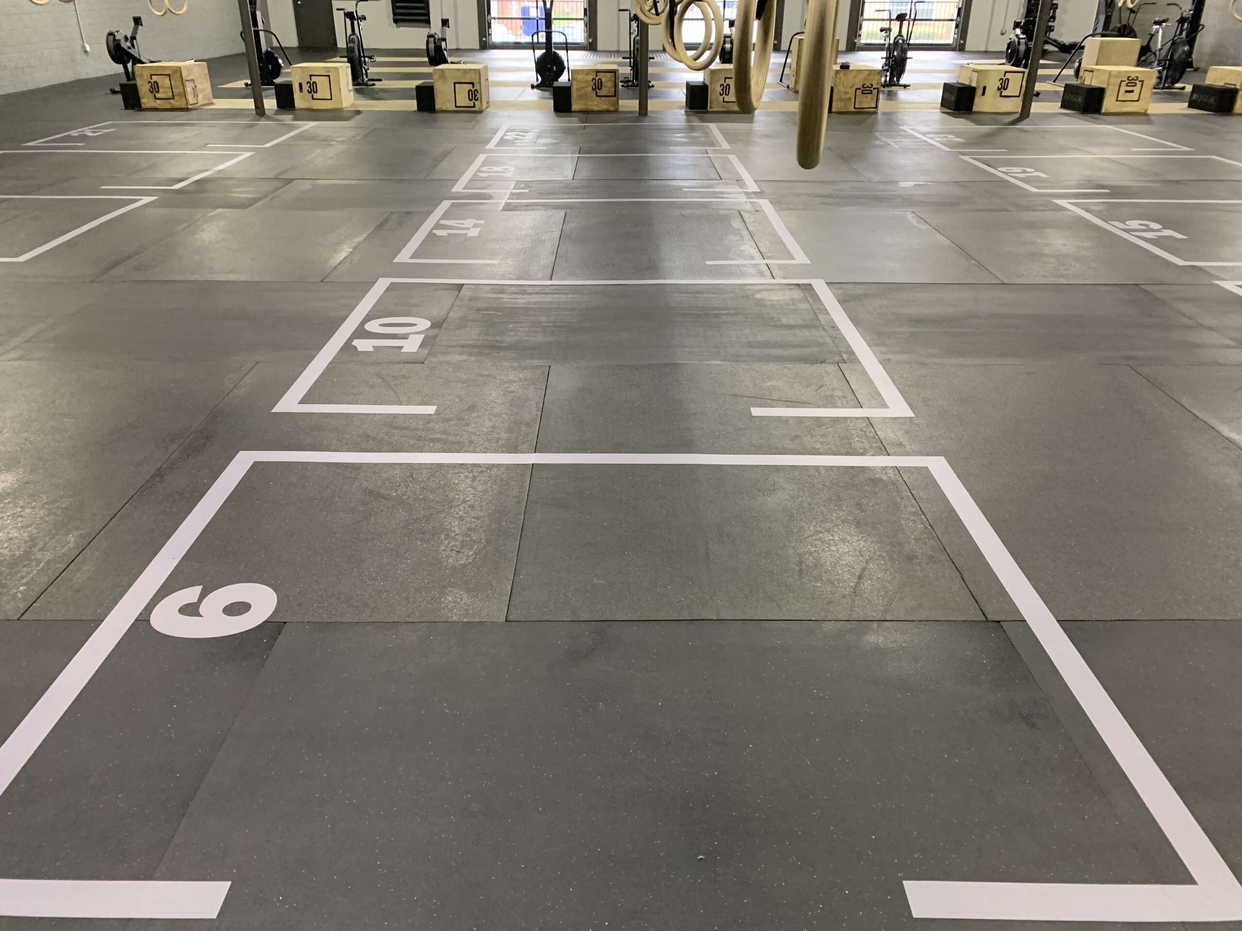 Competition-grade floor graphics for gyms, textured vinyl for safe and tough workouts.