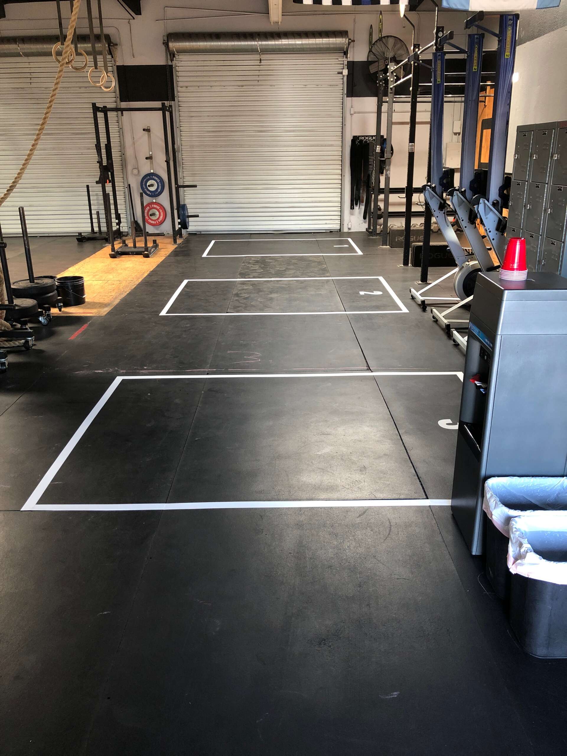 Floor grid decals for gyms, durable vinyl for safe distancing and intense workouts.