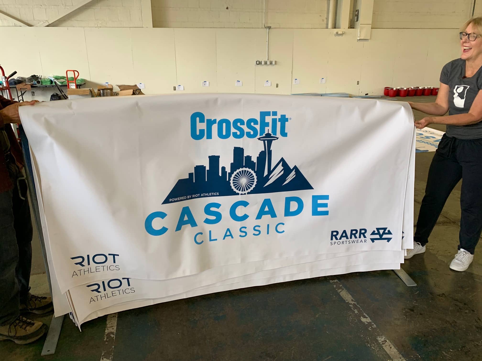 Branded crowd control barricade wrap at sports venue