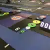 Thumbnail of gym interior featuring athlete nameplates with custom wall branding