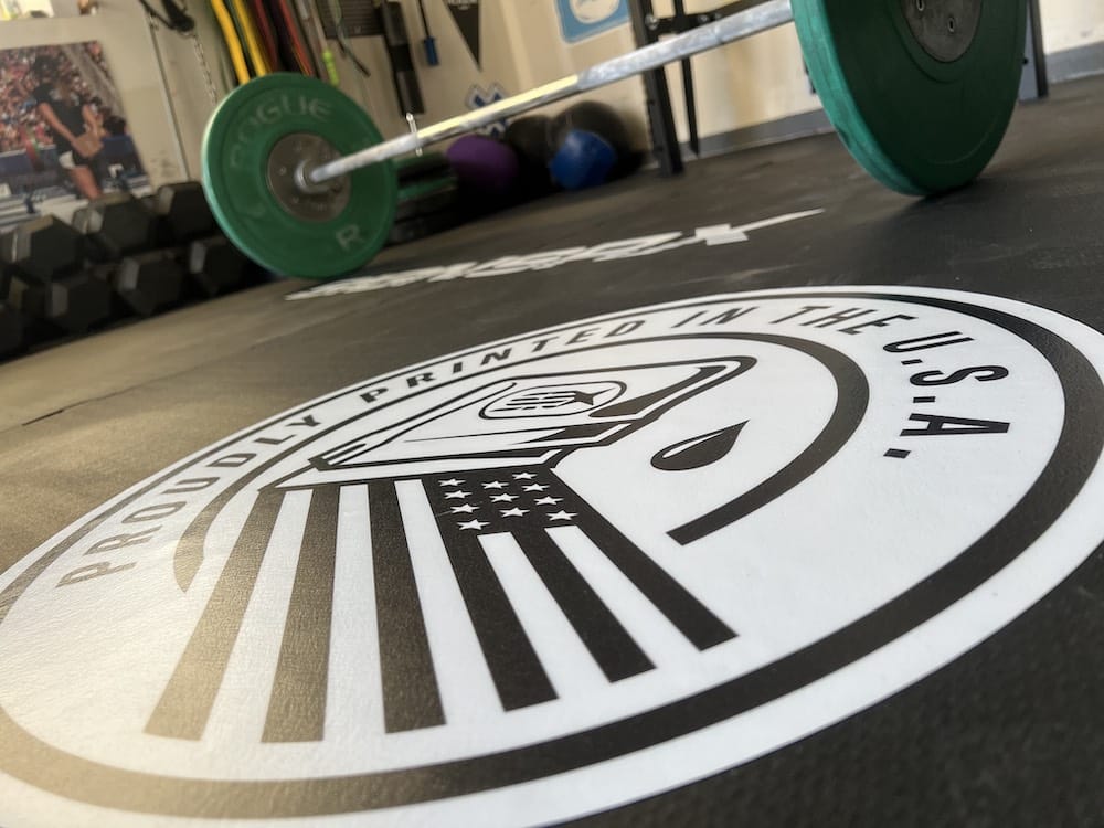 Custom weightlifting platform with gym logo decal for stability