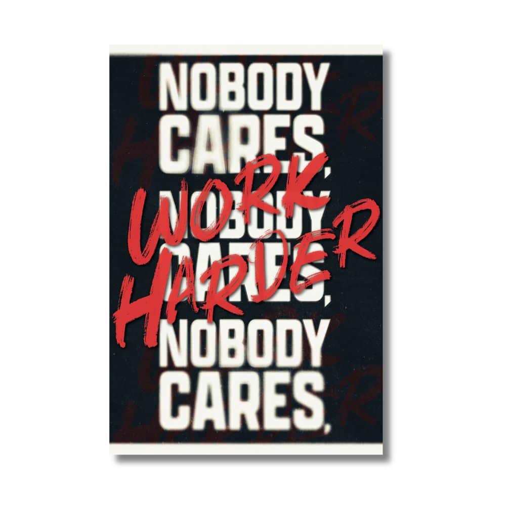 Motivational gym sign reading “Nobody Cares, Work Harder”