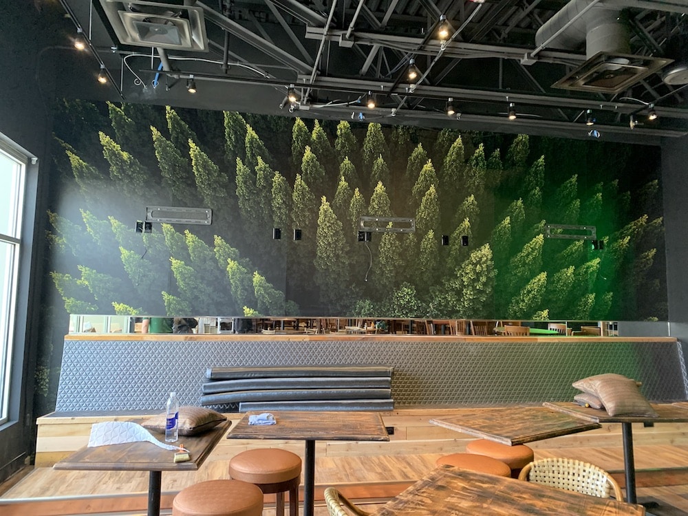 Customizable fabric adhesive for vibrant, seamless wall graphics