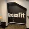 Removable fabric adhesive for seamless, vivid wall graphics